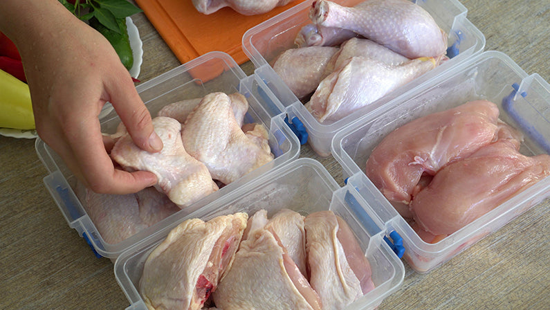 Housewife Portions Out Whole Chicken, And Freeze Pieces In A Separate Container. Chicken: Cutting, Freezing, Storing, Marinating, Cooking at Home